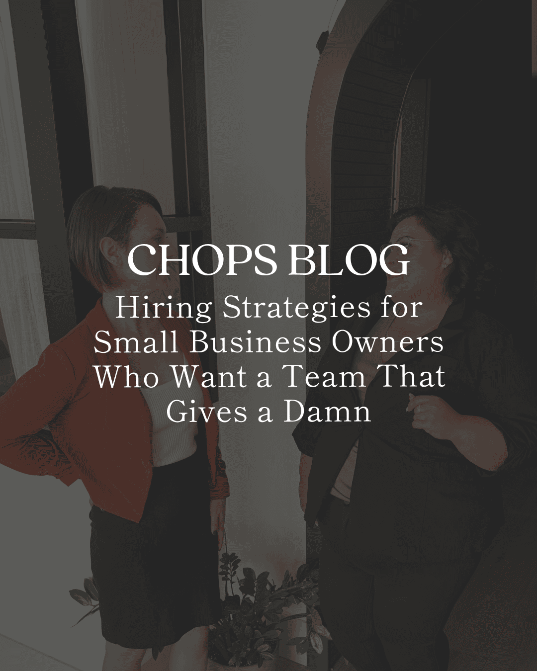 Hiring Strategies for Small Business Owners Who Want a Team That Gives a Damn two employees talking beside a window under an arch